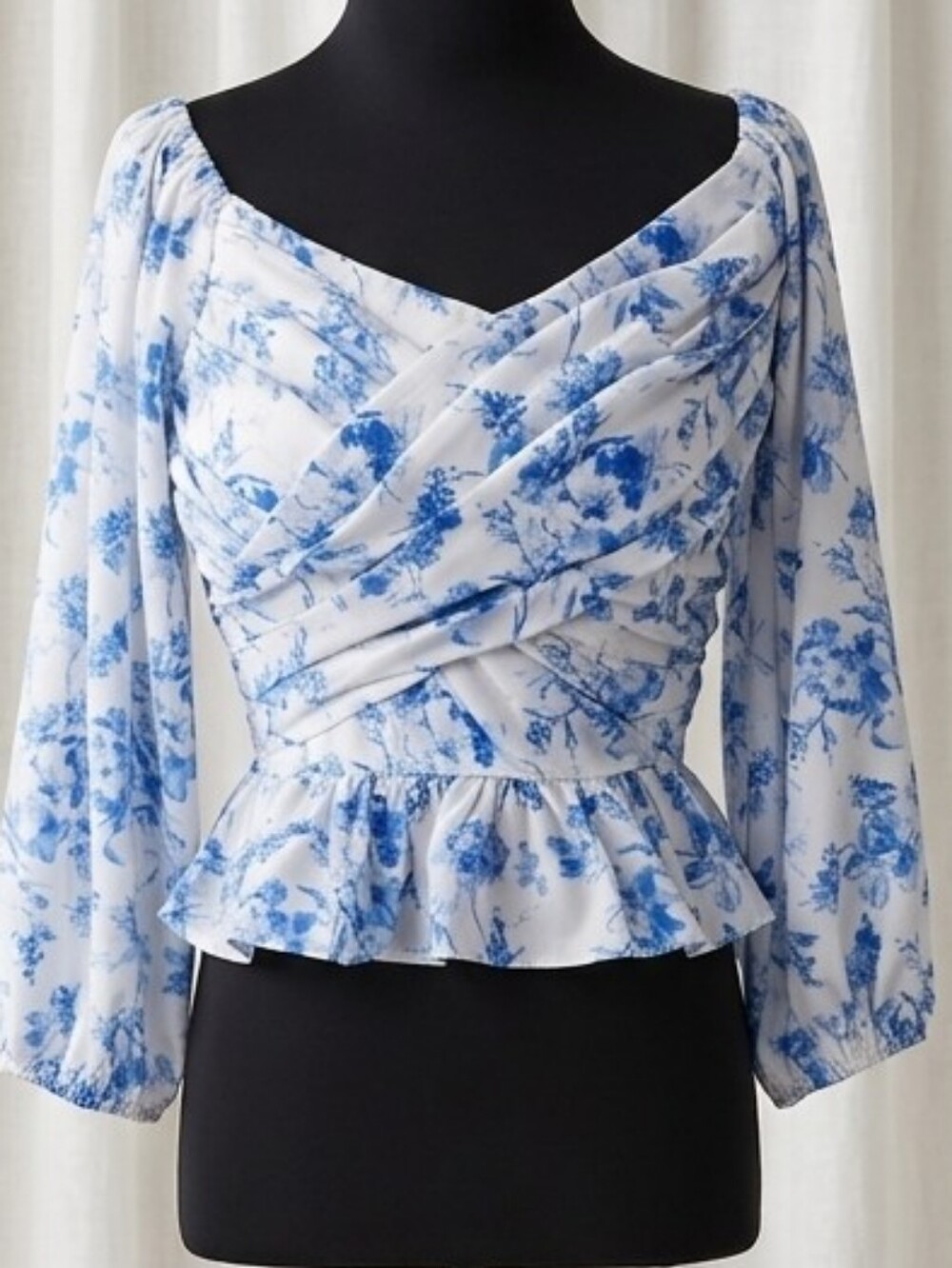 entro White and Blue Floral Peplum Wrap Top